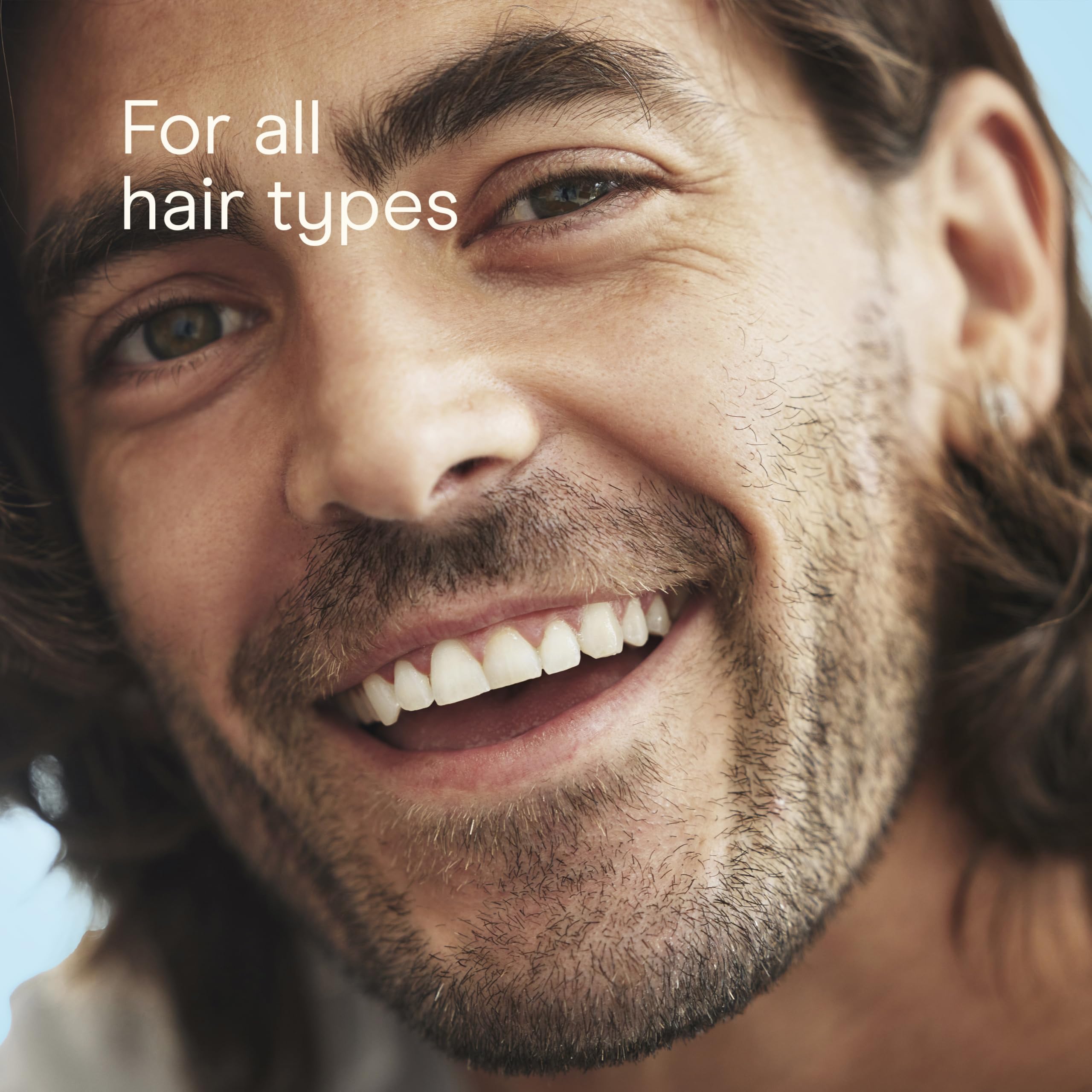 Conair Men brush in sleek black finish for daily grooming.
