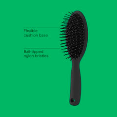Conair Men brush shows cushioned base for flexible, snag-free brushing.