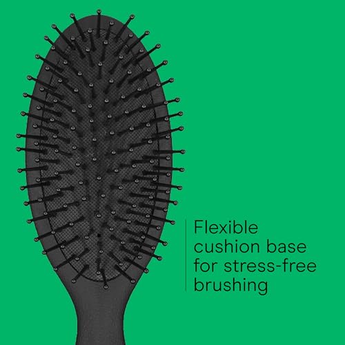 Conair Men detangler brush in action for everyday grooming across hair types.