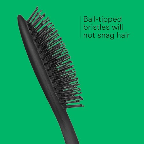 Conair Men travel brush fits in a Dopp kit for on-the-go styling.
