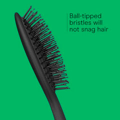 Conair Men travel brush fits in a Dopp kit for on-the-go styling.