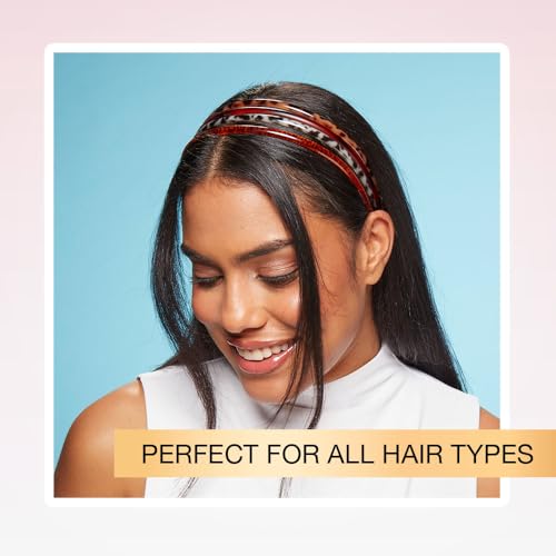 Conair Scunci headband worn to hold hair back during activities.