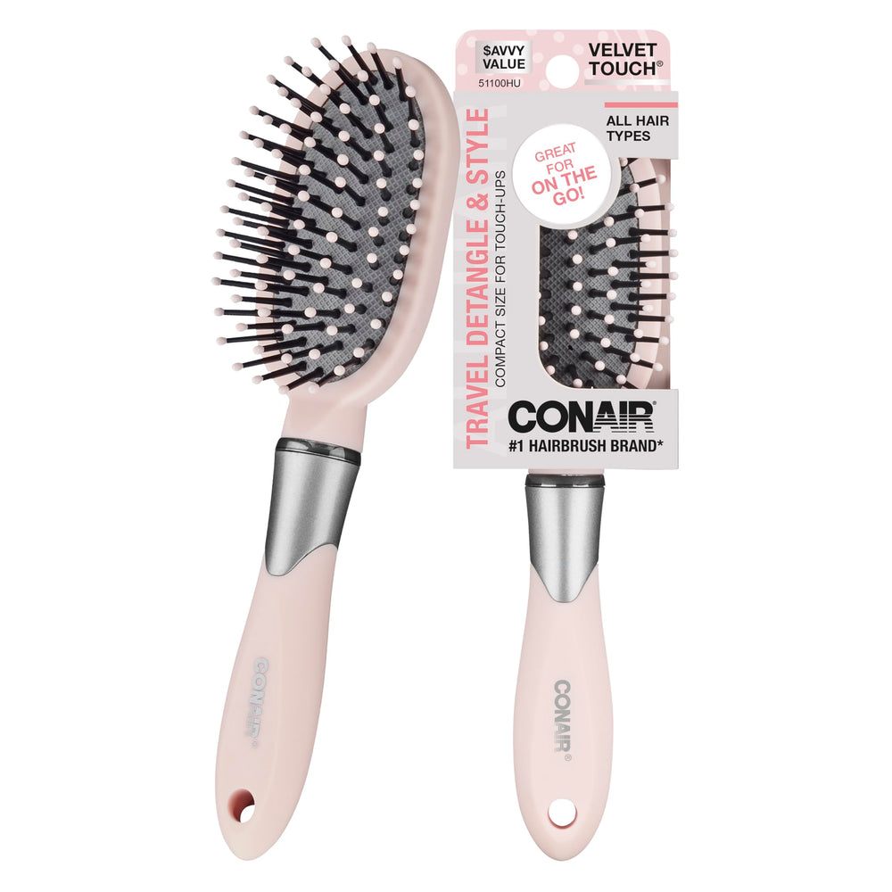 Conair Velvet Touch Cushion Brush close-up showing a flexible cushion for gentle detangling.