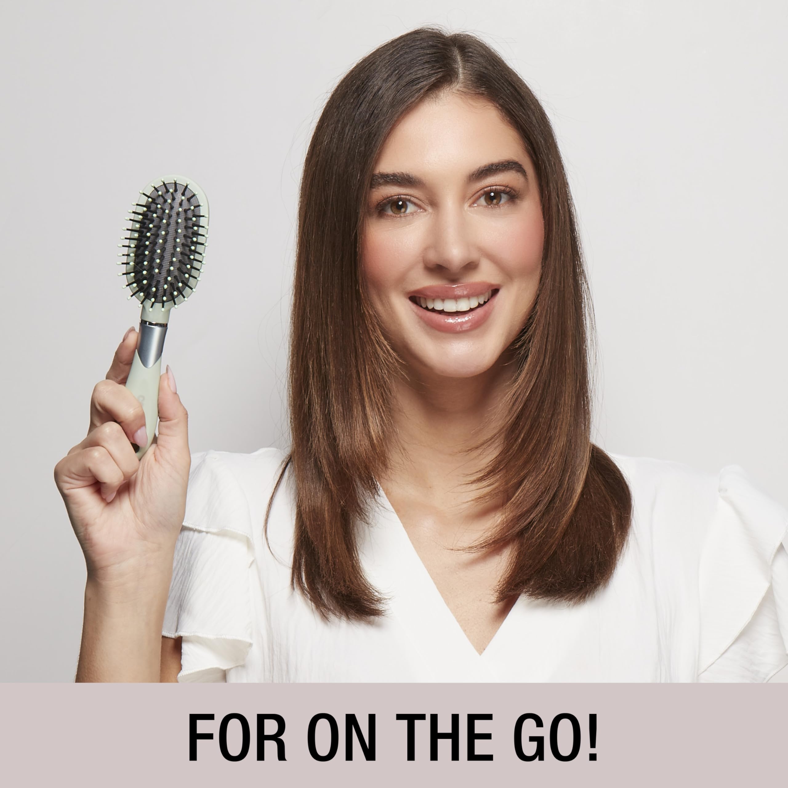 Conair Velvet Touch detangling brush ideal for wet or dry hair.