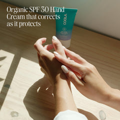 Close-up of COOLA texture reveals rich mango seed butter for deep moisturization.
