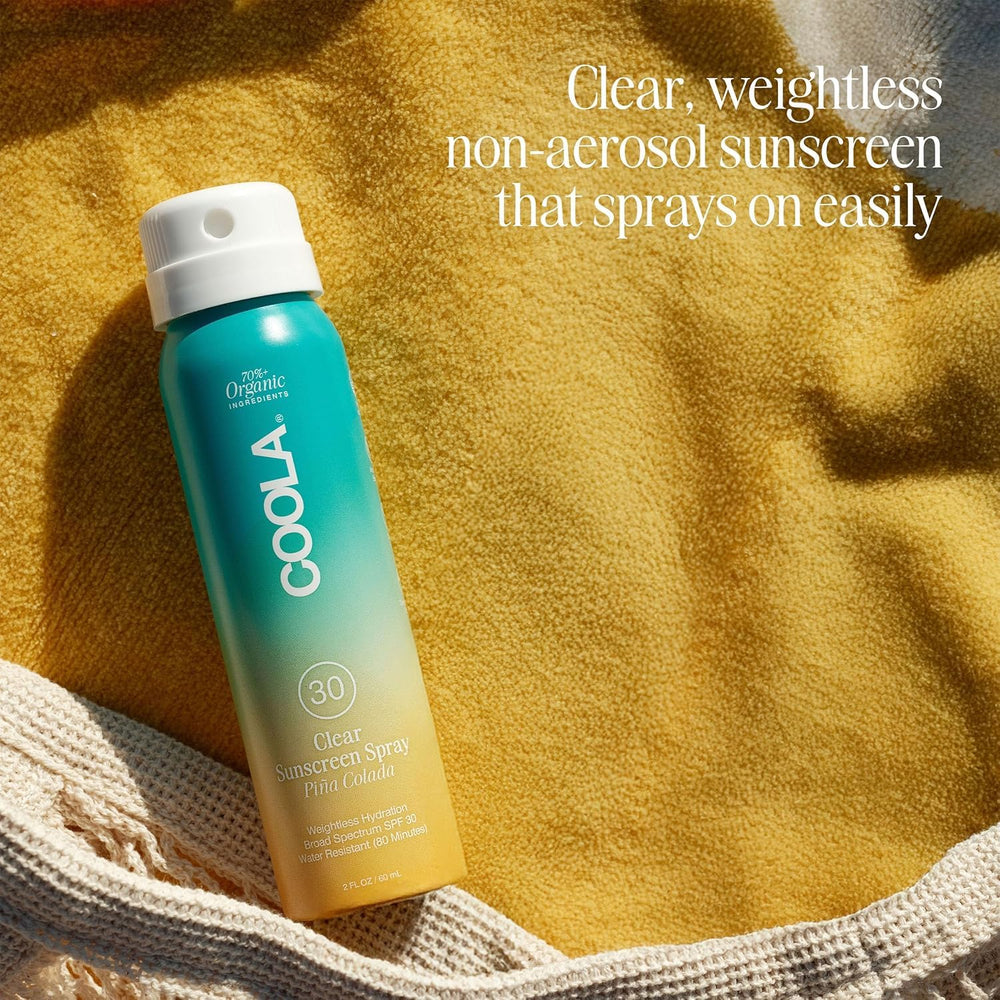 COOLA dermatologist-tested sunscreen label on vegan, gluten-free bottle.