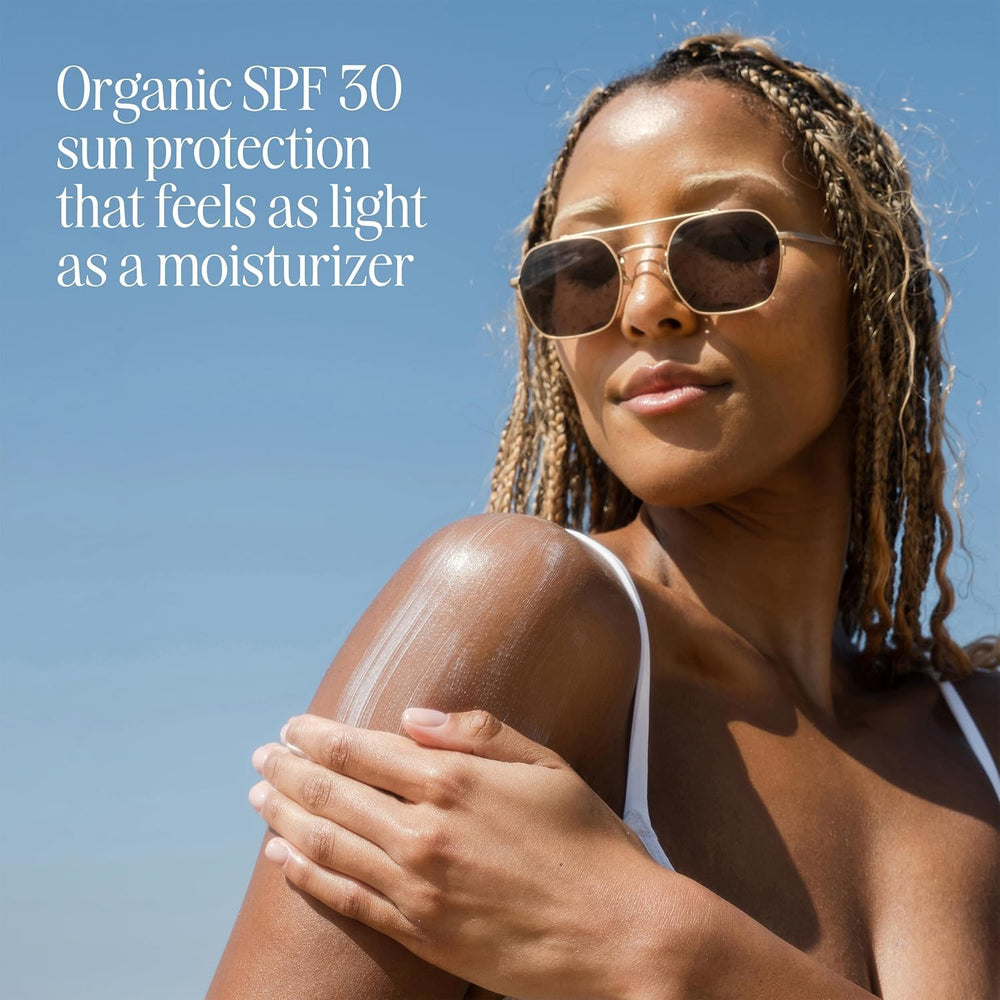 COOLA Guava Mango sunscreen application shows smooth, sheer coverage.