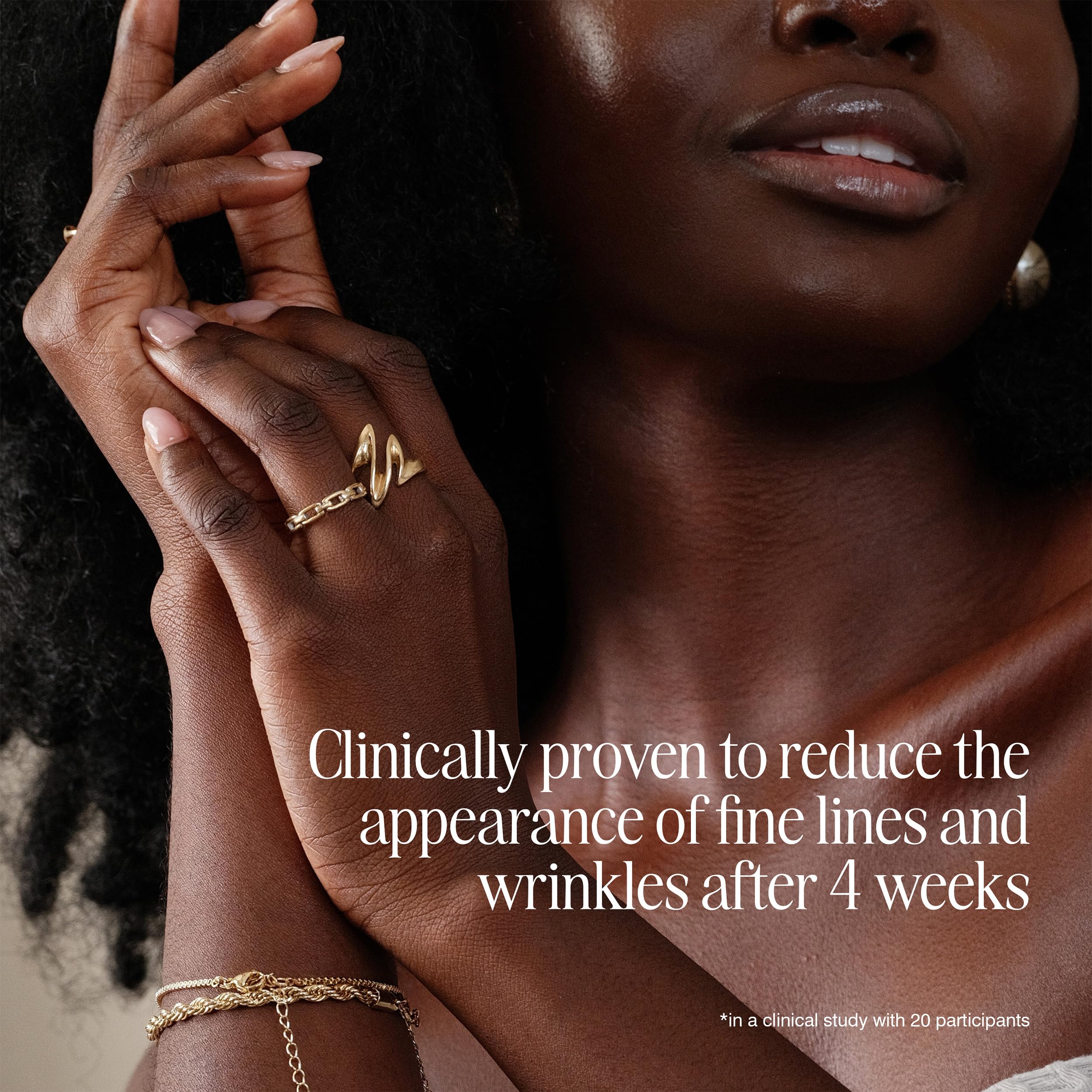 Hands applying COOLA cream suggest quick absorption and smoothing effect.