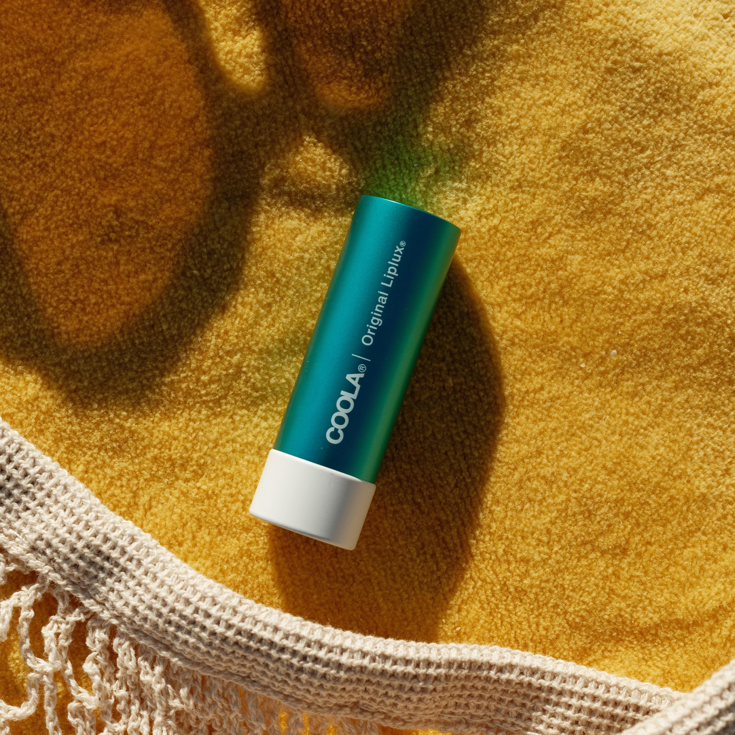 COOLA Liplux vegano, sin gluten y sin parabenos para uso diario.