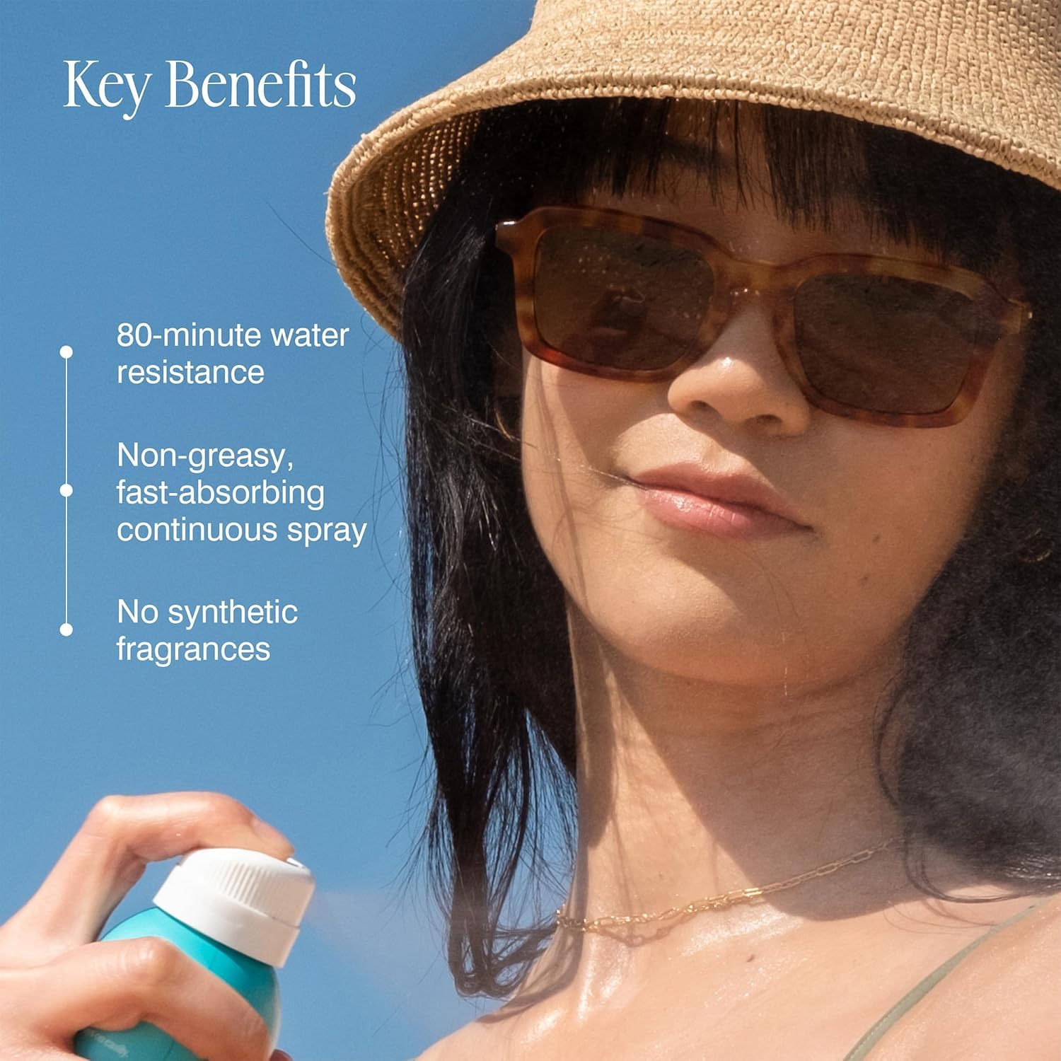 COOLA travel-size sunscreen spray kit with 2oz bottles for on‑the‑go use.