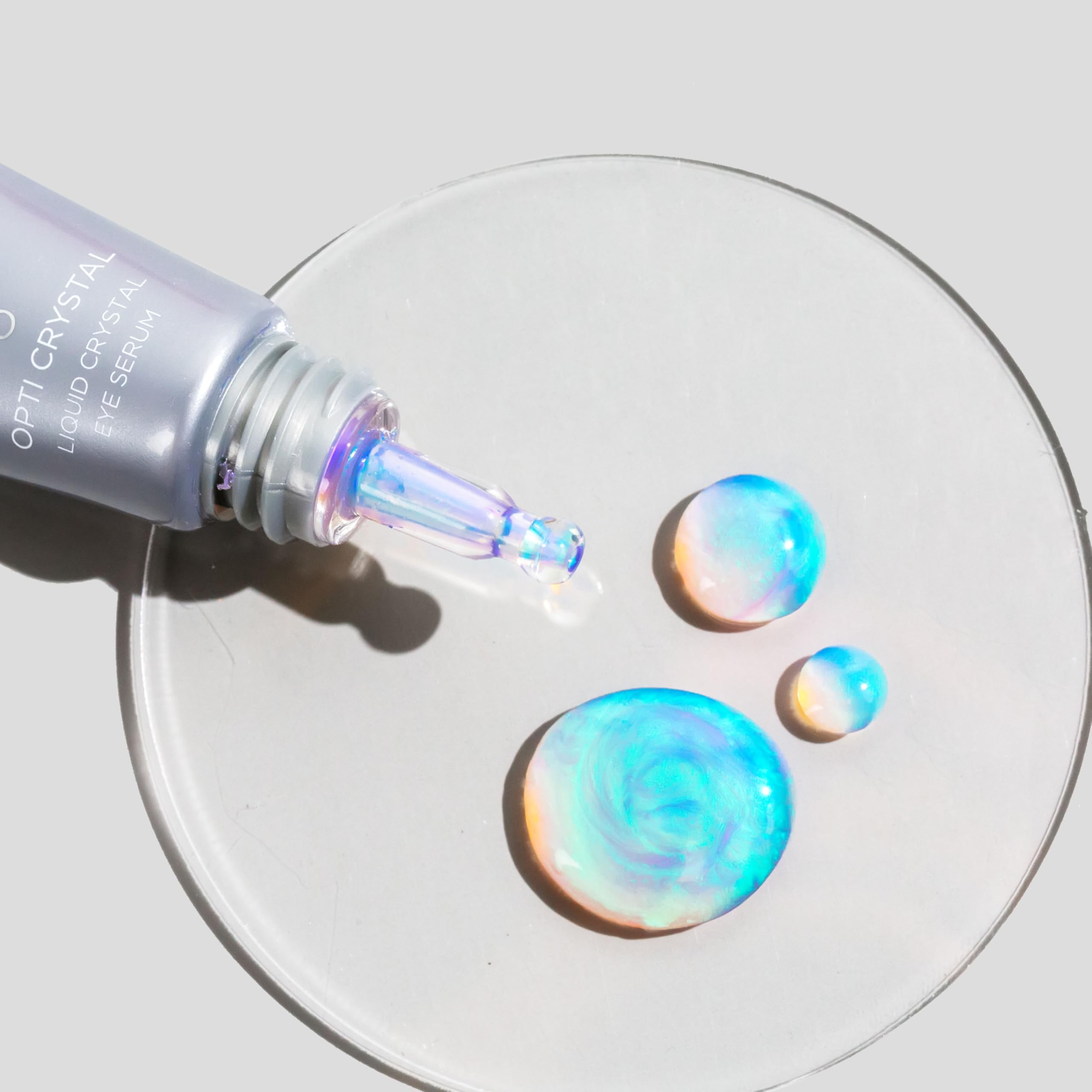 COSMEDIX Opti Crystal alpha-lipoic acid ingredient spotlight beside bottle