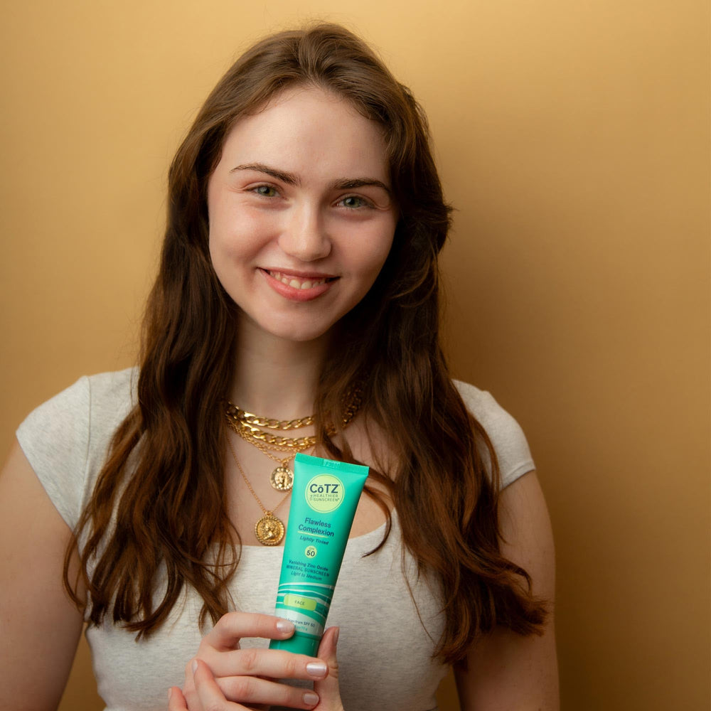 Model applying tint shows seamless blend with skin tone