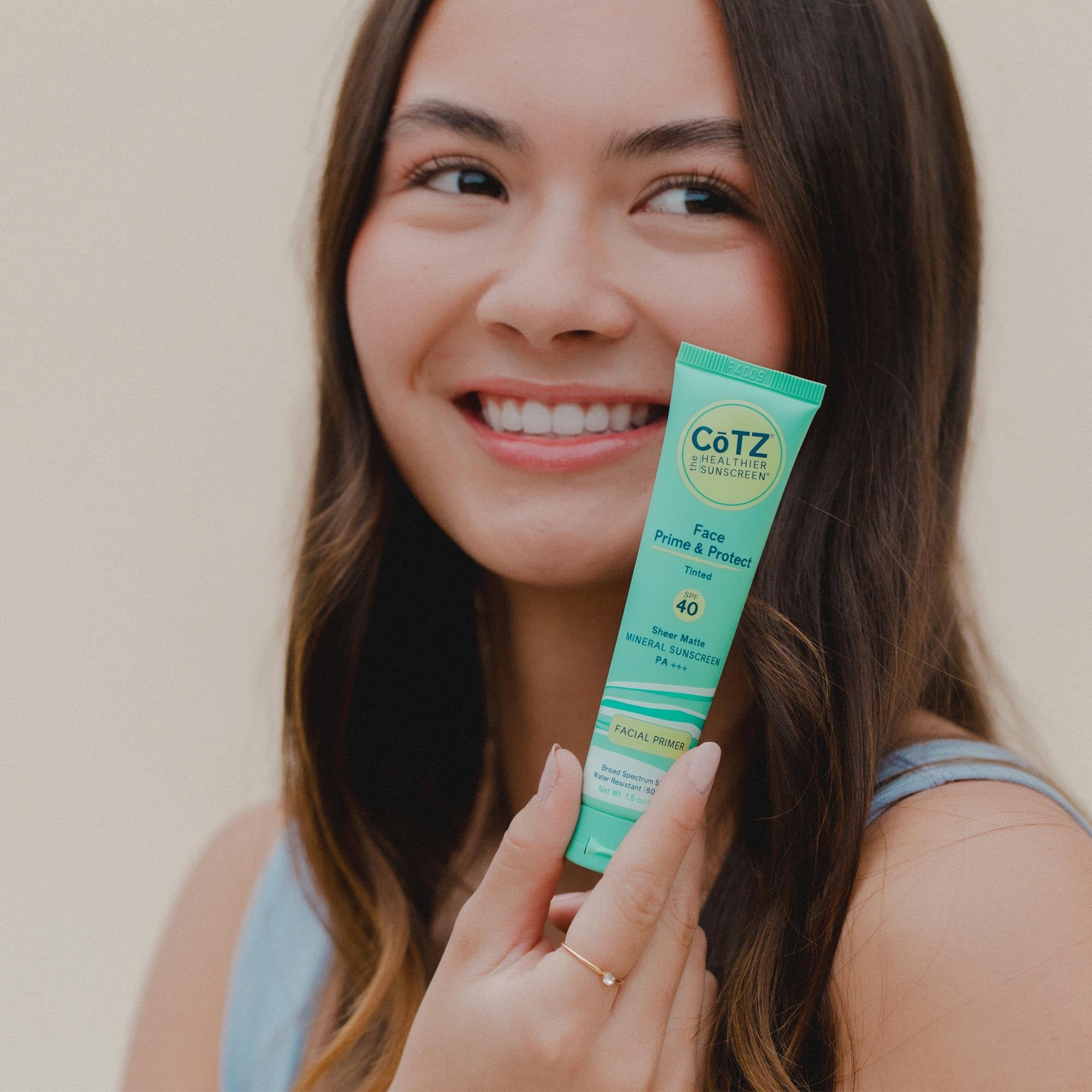 CoTZ under-makeup application demonstrates skin-prep for a smooth base.