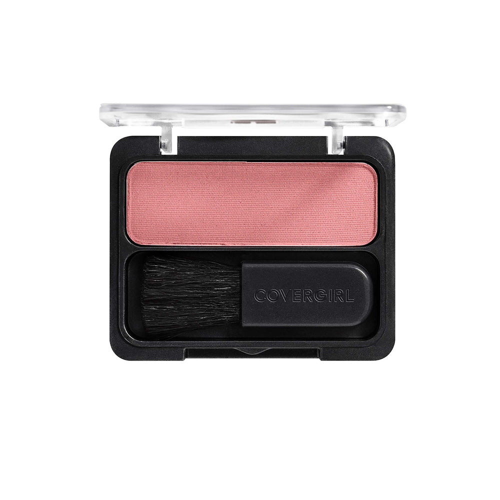 Applying CoverGirl Cheekers Blush for a lightweight, fresh look.