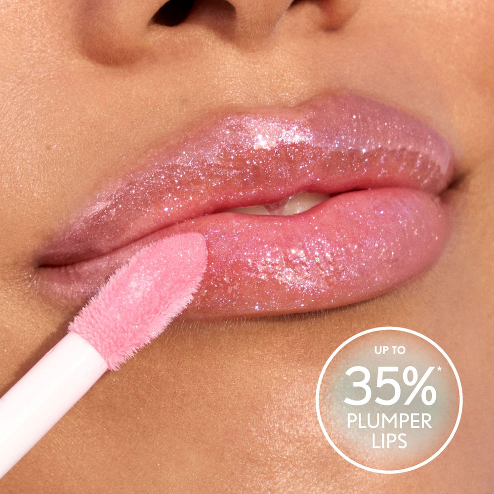 Plush applicator from CoverGirl Yummy Gloss deposits right amount for touch-ups.