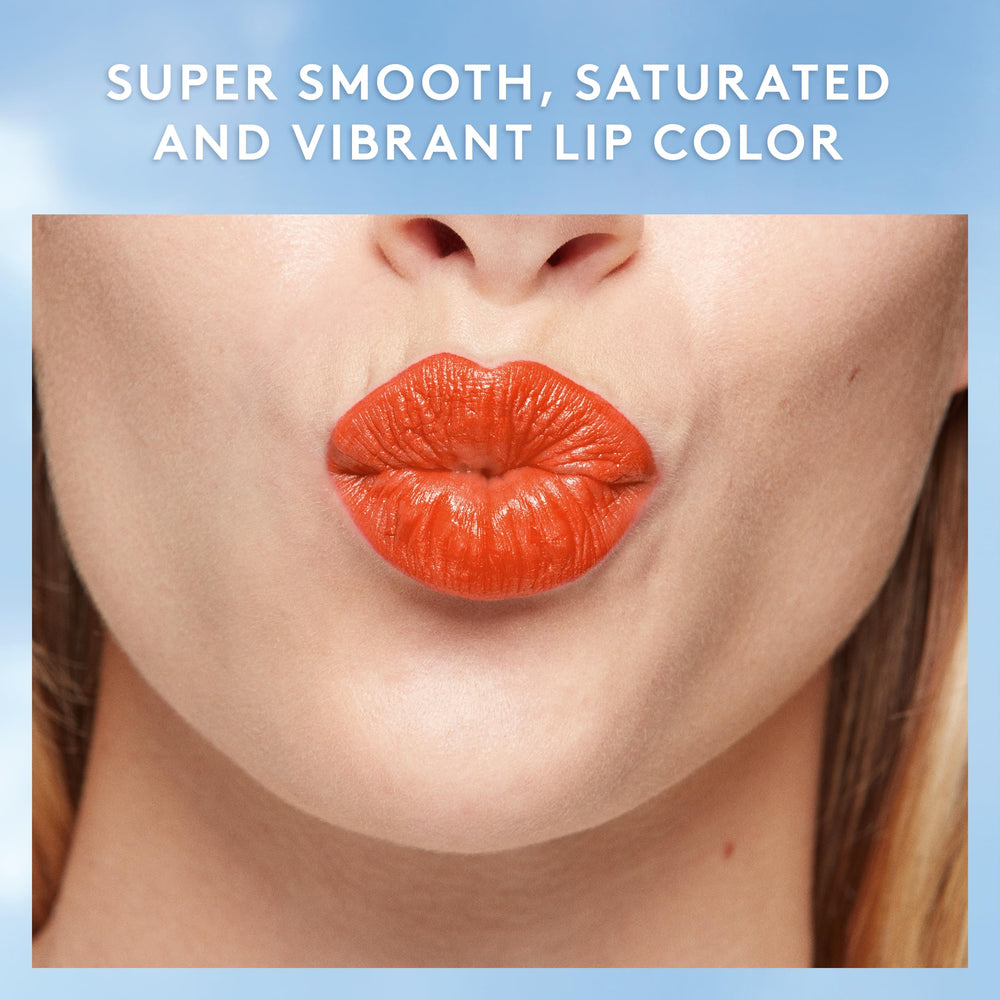 CoverGirl Exhibitionist Cream Lipstick Orange AF packaging close-up highlights sleek design