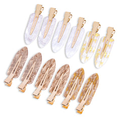 Cptots No Crease flat clip in white gold keeps hair smooth and marks-free all day.