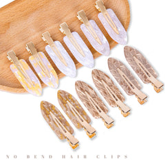 Cptots non-slip flat clip with metal acrylic build holds thick or thin hair securely.