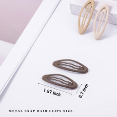 Cptots oval snap clip in brown shown on bangs for all-day hold.