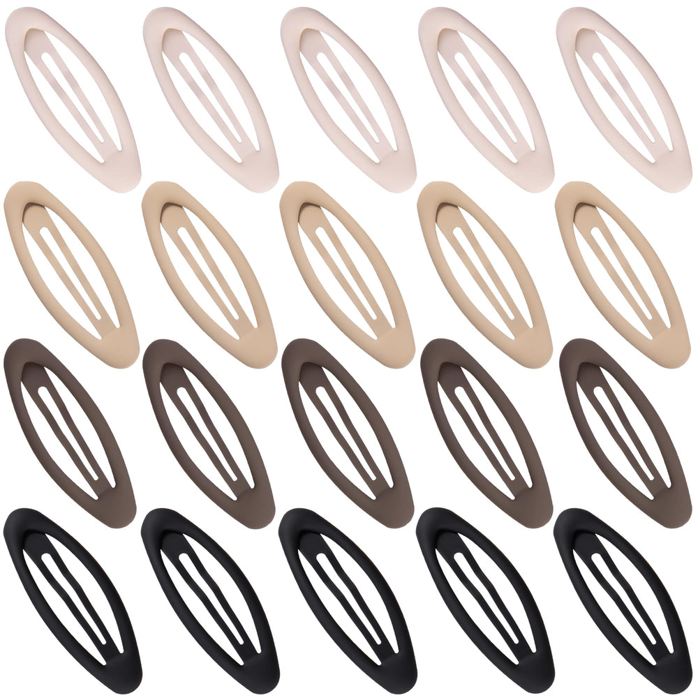 Cptots oval snap clip in matte black secures fine hair securely.
