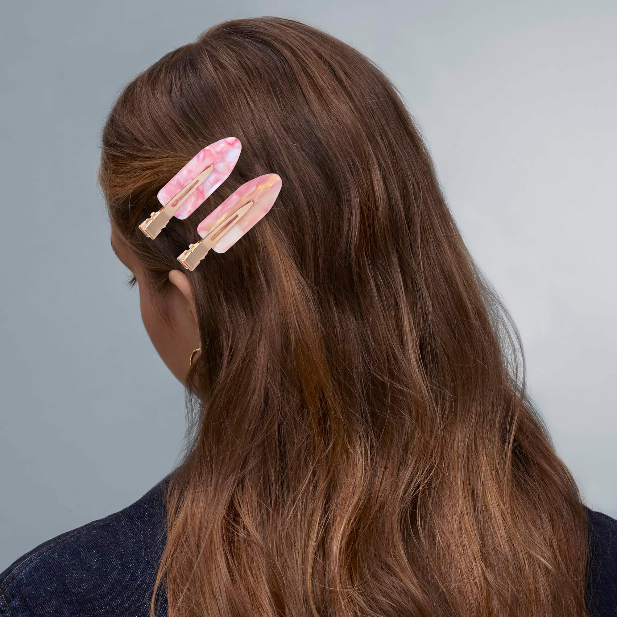 Pinzas Cptots duraderas con color resistente en rosa.