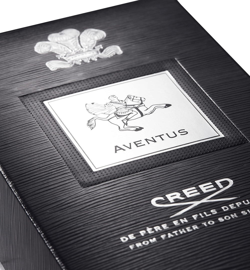 Creed Aventus spray action demonstrates targeted application on pulse points.