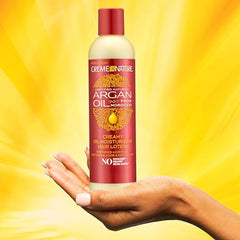 Creme of Nature Aceite de Argán, textura cremosa para hidratación suave.