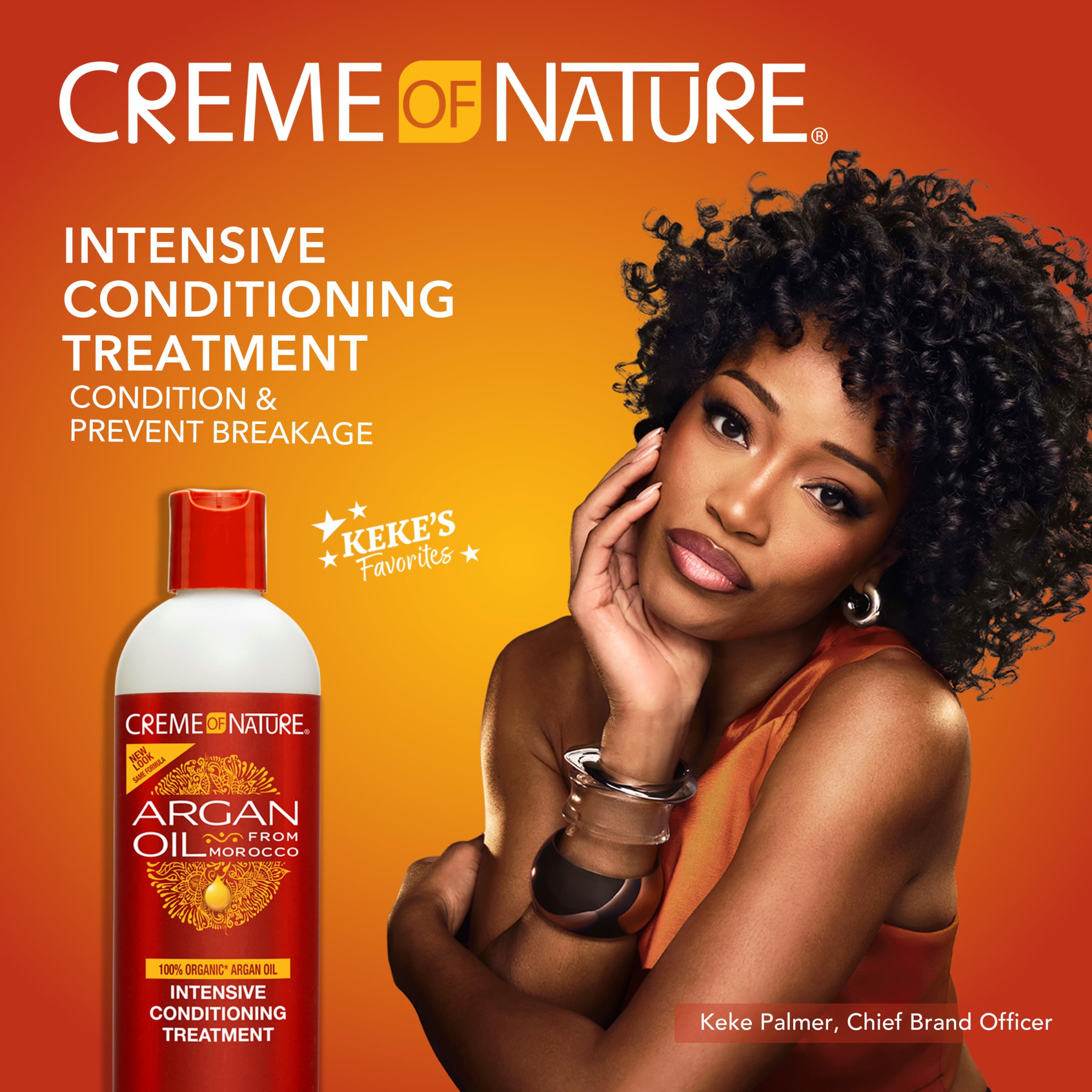Applying Creme of Nature Intensive Conditioning Treatment to hair for easy detangling