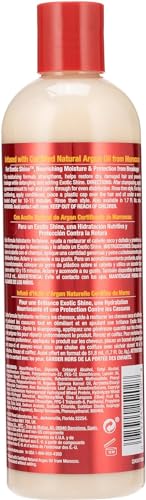 Creamy texture closeup of Creme of Nature Intensive Conditioning Treatment for hydrated hair