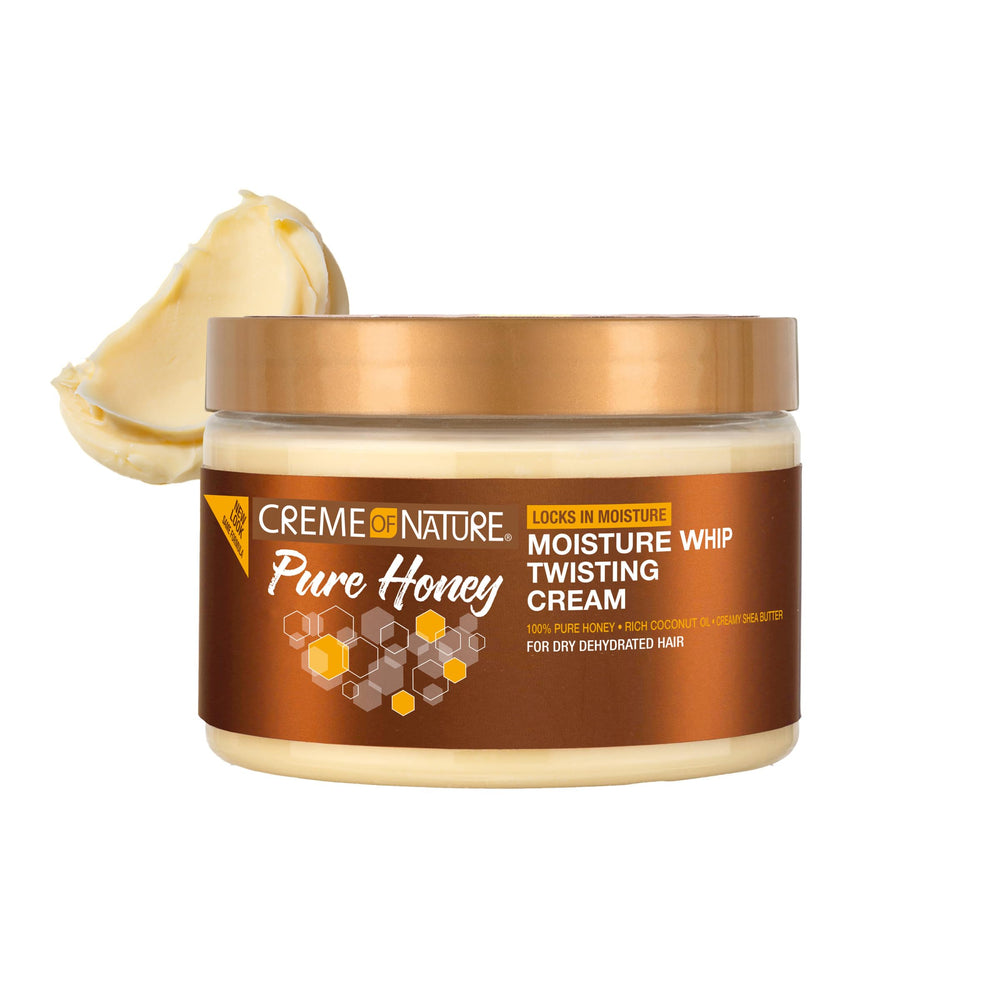 Creme of Nature Pure Honey Define Moisture Whip Twisting Cream twist-out close-up showing elongated curls.