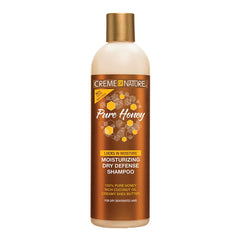 Creme of Nature Pure Honey Dry Defense shampoo bottle, sulfate-free hydration for dry hair.