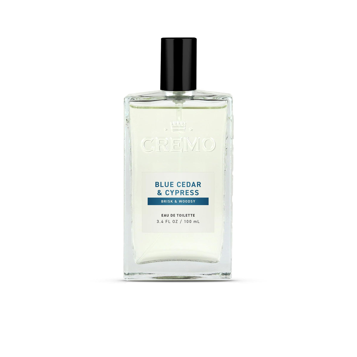 Cremo Blue Cedar and Cypress bottle front view highlights refined daily scent