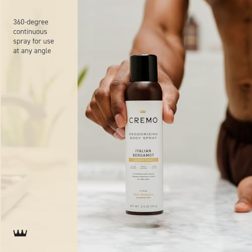 Cremo Italian Bergamot spray in mid-application for even scent distribution.