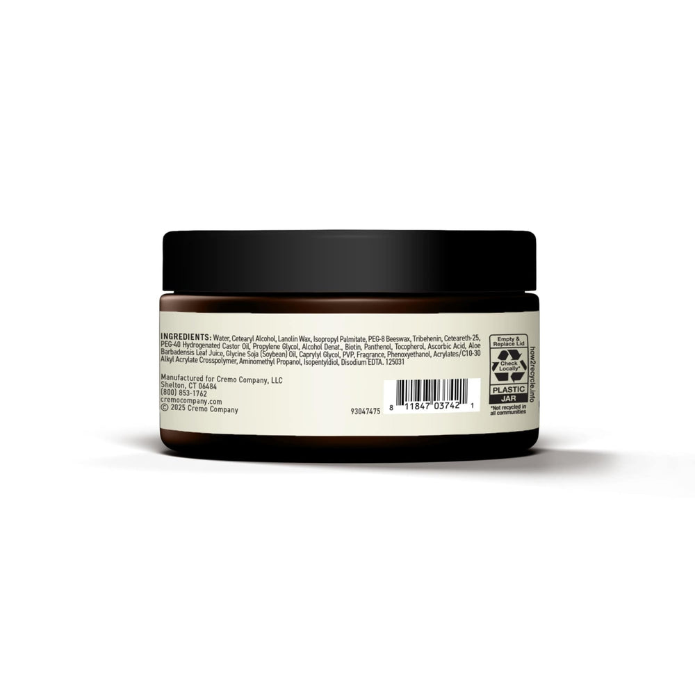 Envase de 3.4 oz de Cremo, compacto para viajar.