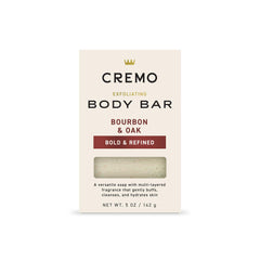 Cremo Bourbon & Oak exfoliating bar with lava rock smooths skin and buffs.