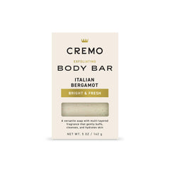 Cremo Exfoliating Body Bar with Italian Bergamot lather and lava rock for gentle buffing.