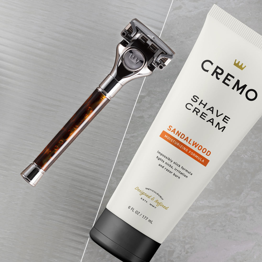 Cremo Sandalwood Shave Cream close-up demonstrates razor glide across skin.