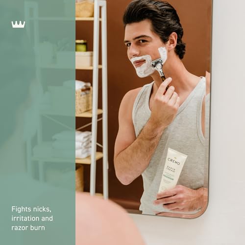 Cremo shave cream application demonstrates slick texture aiding blade glide.