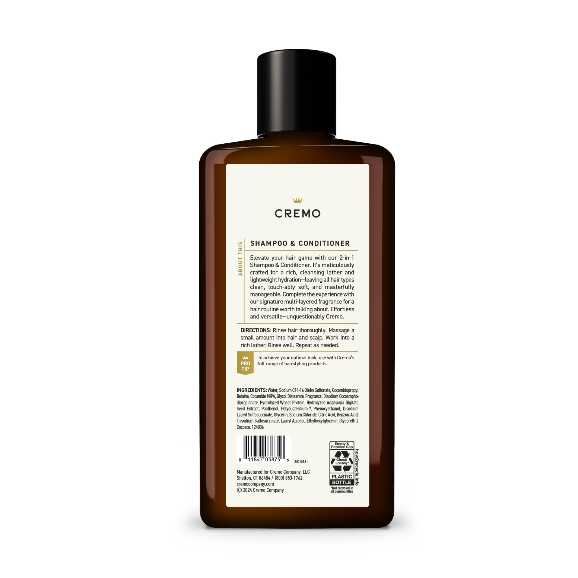 Cremo Spice & Black Vanilla bottle next to towel-dried hair for easy manageability.