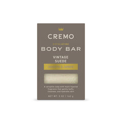 Cremo Vintage Suede body bar with lava rock closeup exfoliates for smoother skin.