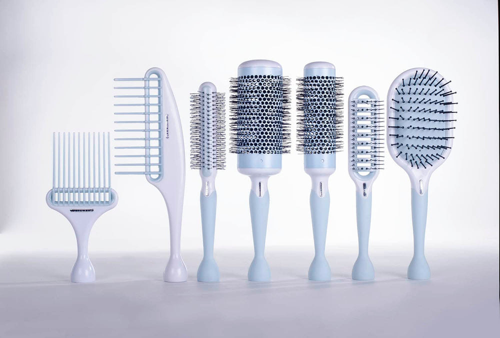 Cricket Friction Free Pick Comb distributes conditioner evenly through hair.