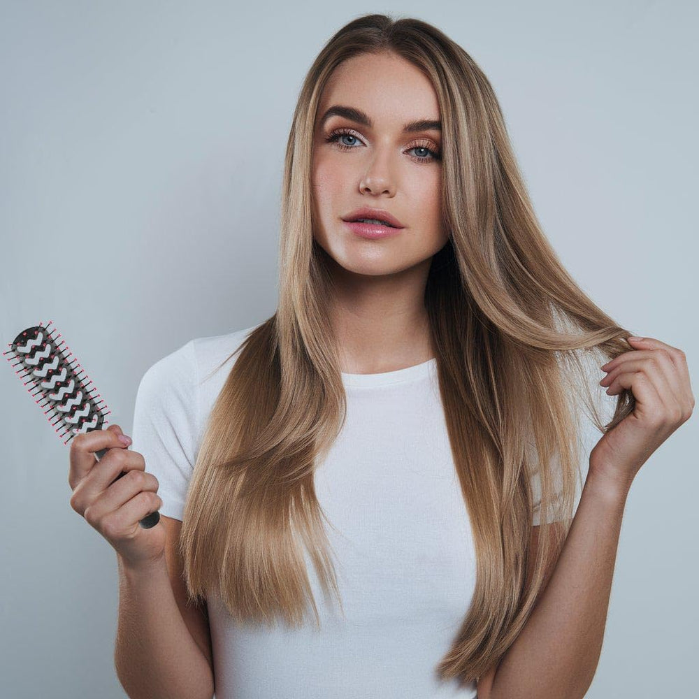 Anti-static bristles reduce flyaways for sleek results with Cricket brush