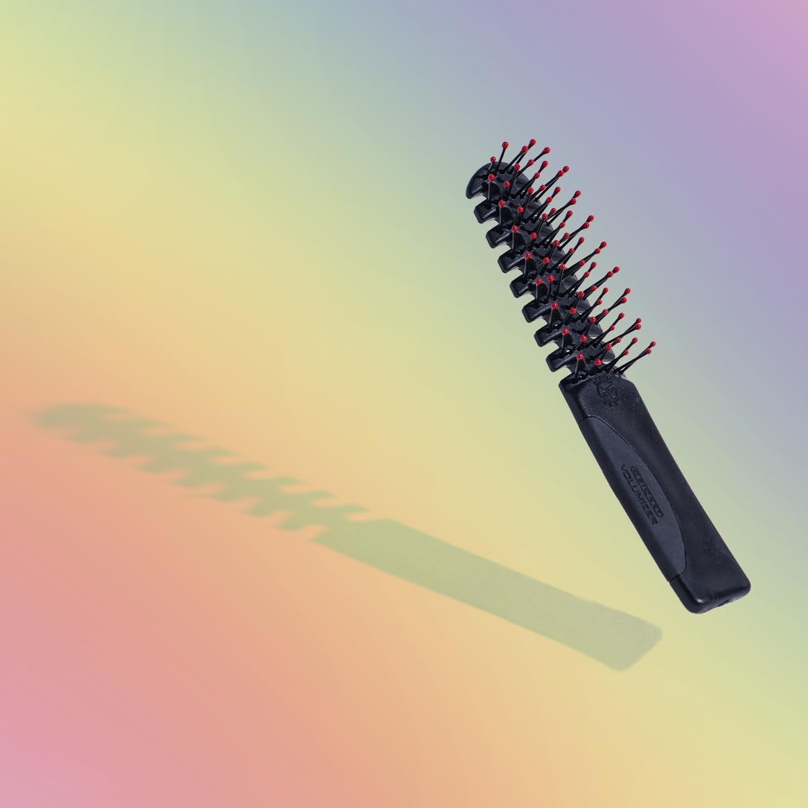 Cricket Static Free Volumizer Brush stay-put ball tips prevent snags during styling.