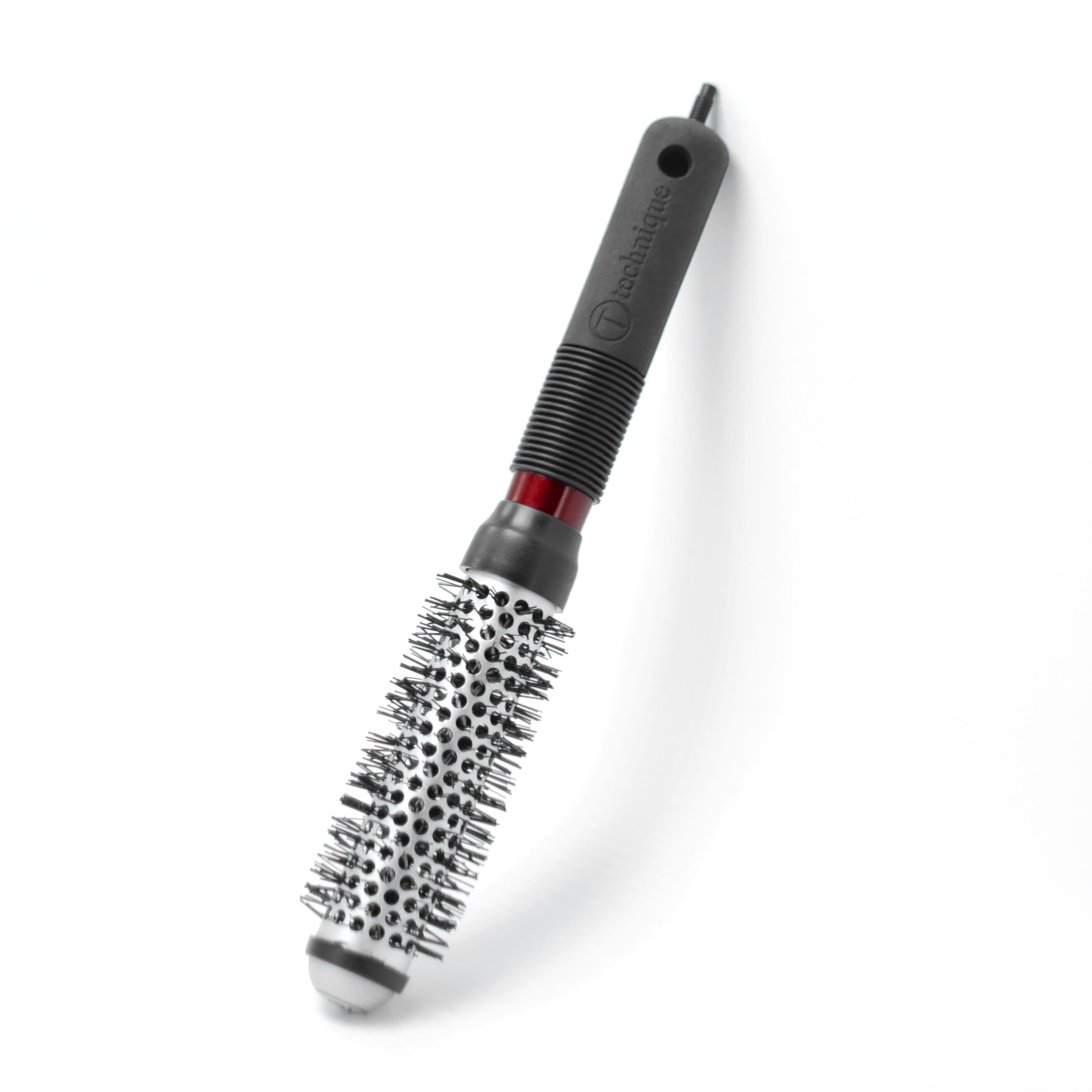 CRICKET Technique 310 1” thermal brush patented sectioning pick stored in handle.