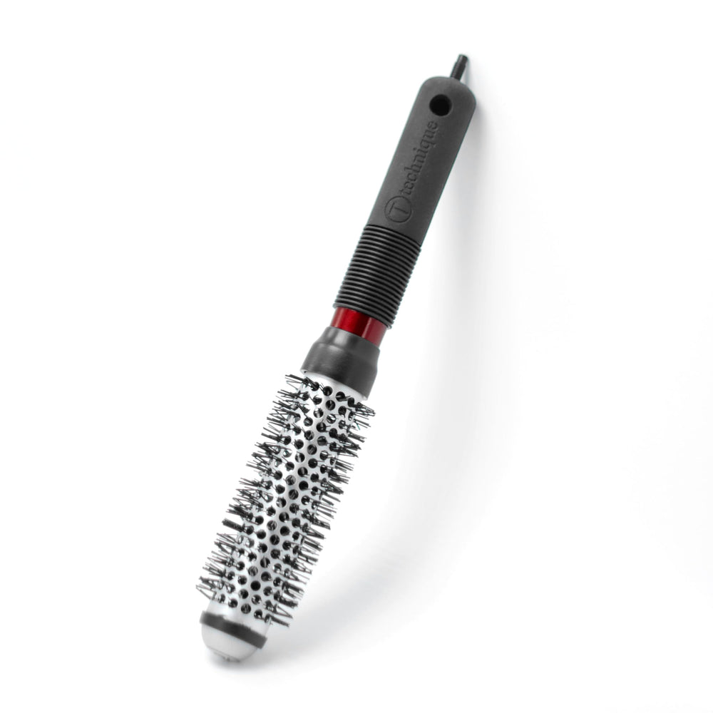 CRICKET Technique 310 1” thermal brush patented sectioning pick stored in handle.