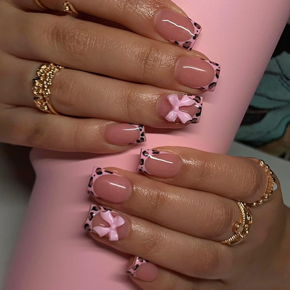 CTTHNBD leopard nails with pink bow for at-home salon-quality manicure