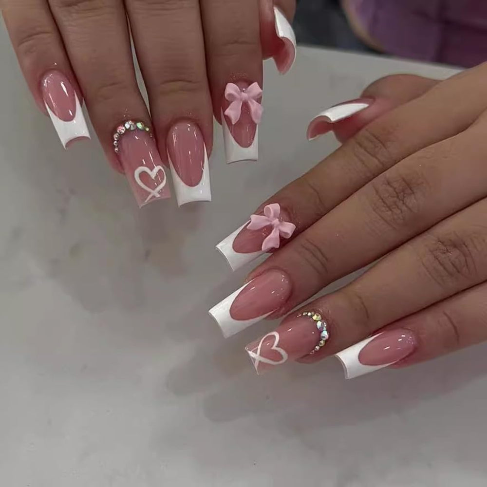 CTTHNBD coffin pink bow heart press-on nails for a chic at-home manicure.
