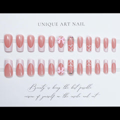CTTHNBD pink medium coffin nails with bow heart design for various occasions.