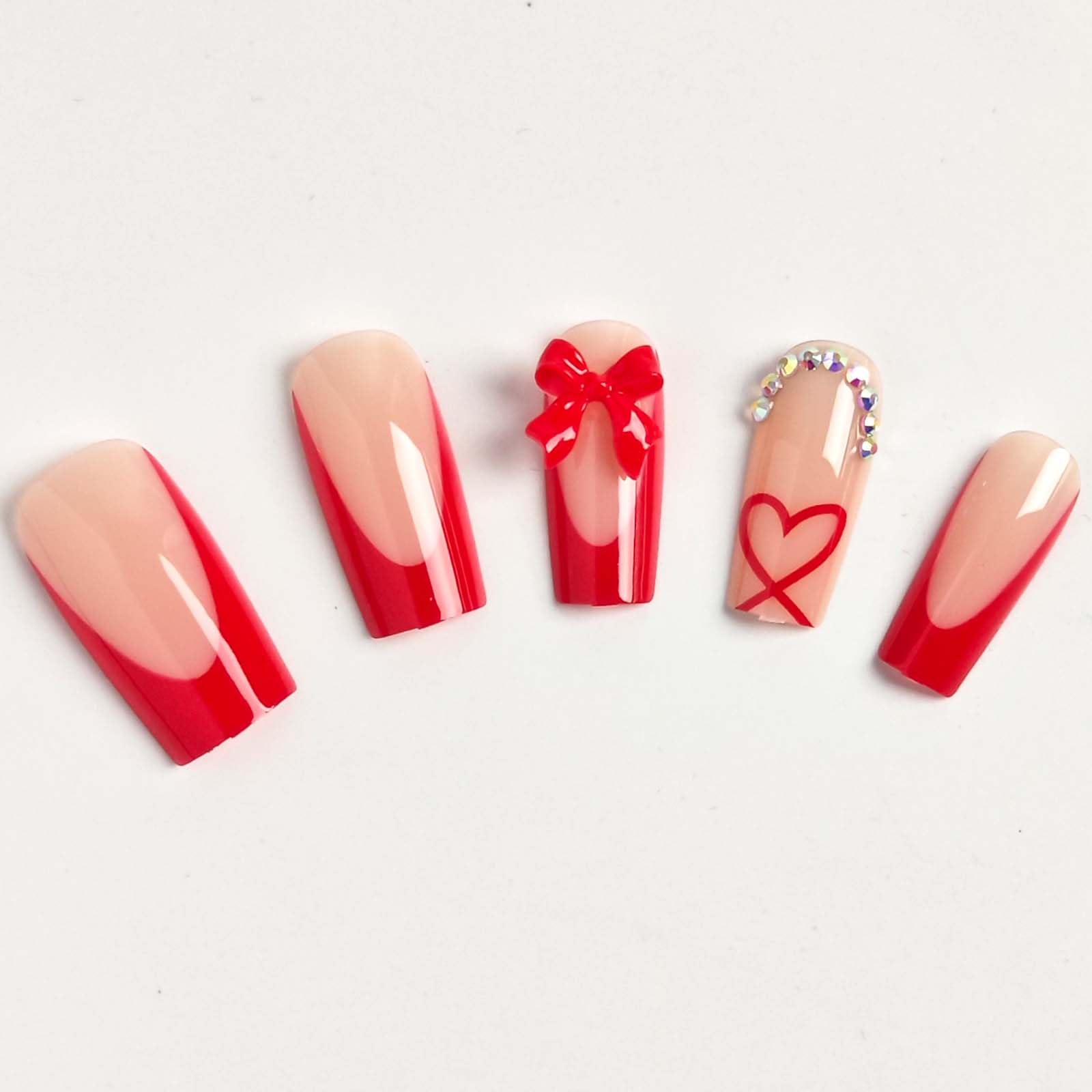 CTTHNBD rhinestone detail on bow-heart nails adds subtle sparkle