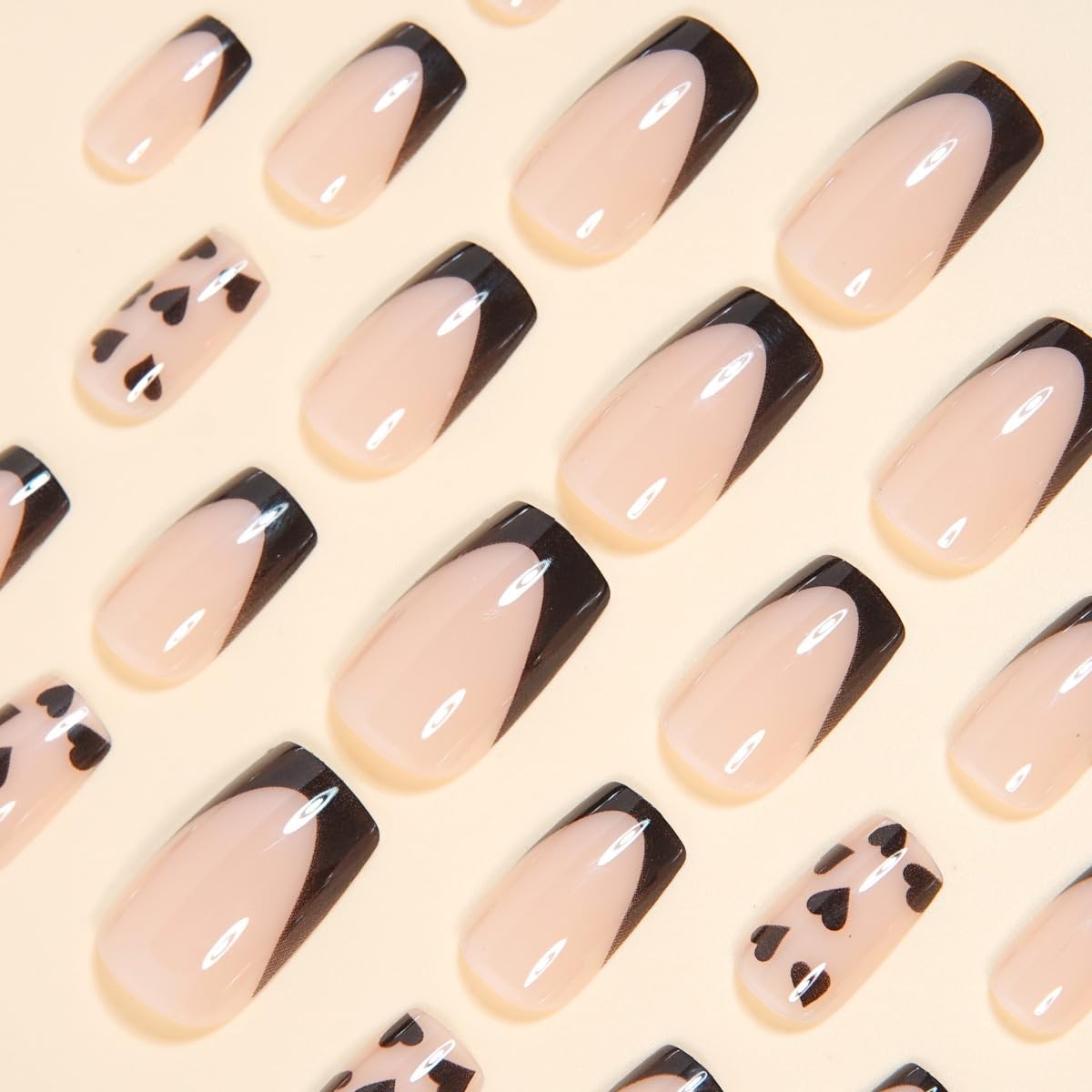 CTTHNBD square nails with black French tips and heart design for elegant events.